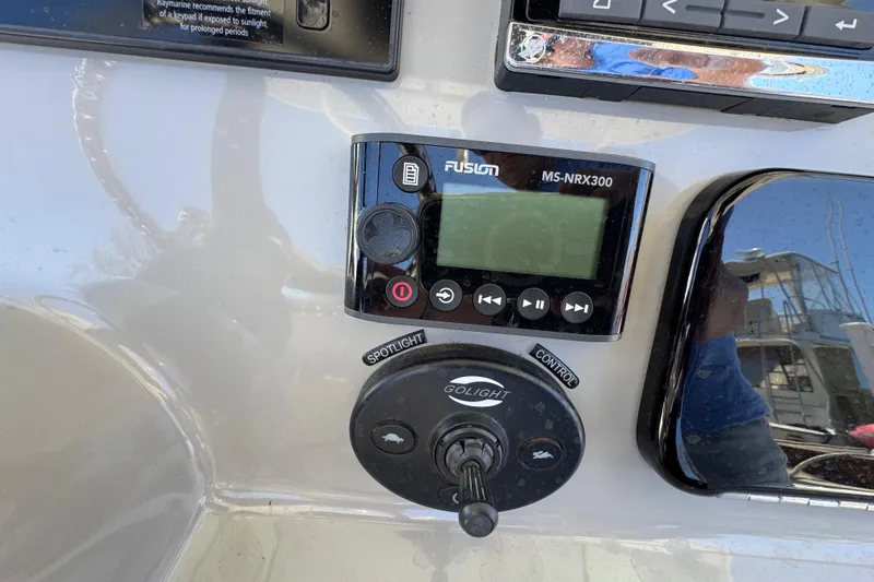 Slide: The Image of Control panel of a 2017 Boston Whaler 250 Outrage with Fusion MS-NRX300. - 8