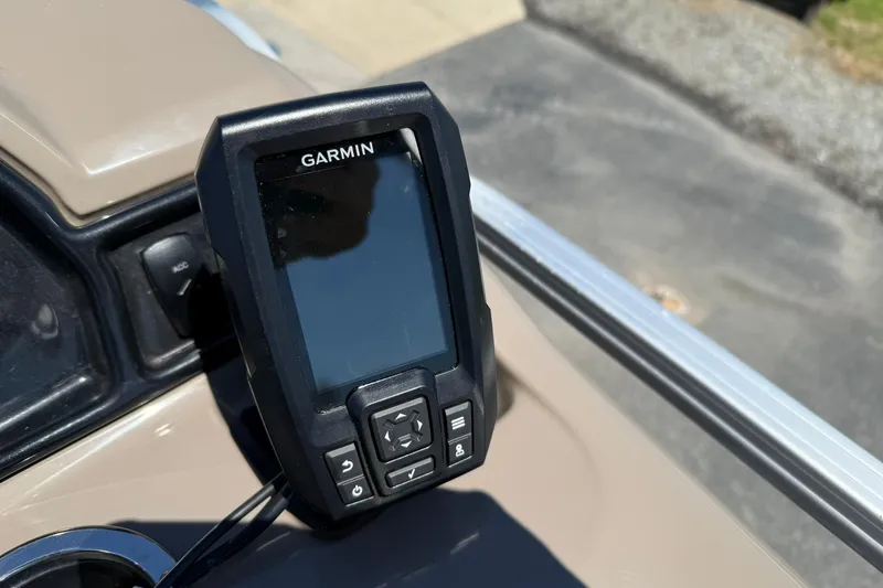 Slide: The Image of Garmin device mounted on a 2022 Ranger 200C dashboard in sunlight. - 14