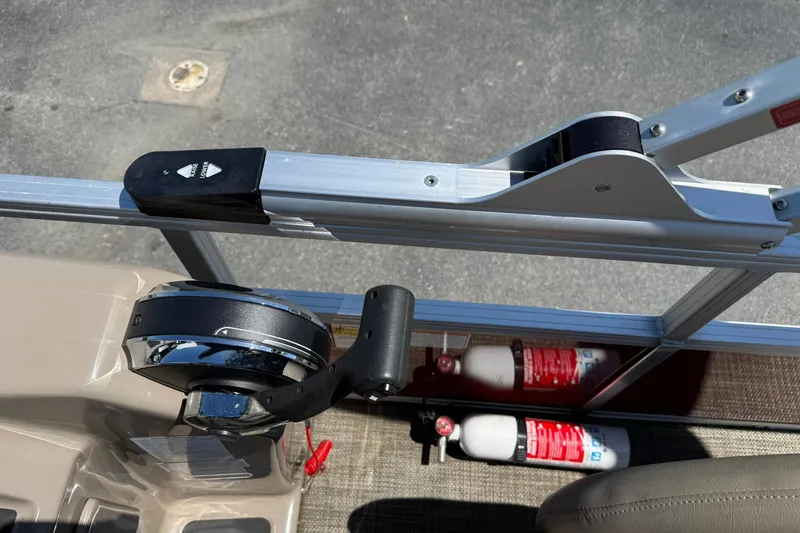 Slide: The Image of Control panel of a 2022 Ranger 200C boat with fire extinguishers visible. - 17