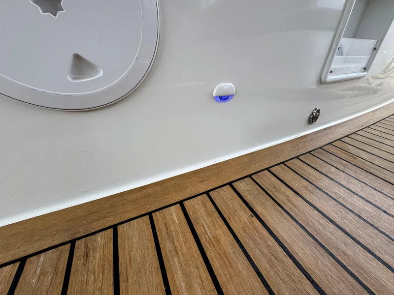 Slide: The Image of Teak deck and hull detail of 2022 Lagoon 46 catamaran. - 42