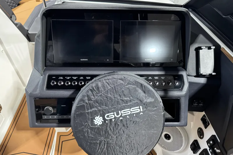 Slide: The Image of 2023 Cobalt R6 Surf dashboard with dual Garmin displays and Gussi Italia steering wheel. - 14