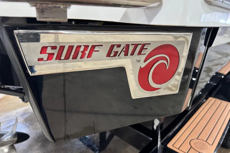 Slide: The Image of 2023 Cobalt R6 Surf boat featuring Surf Gate technology for enhanced wake surfing. - 6