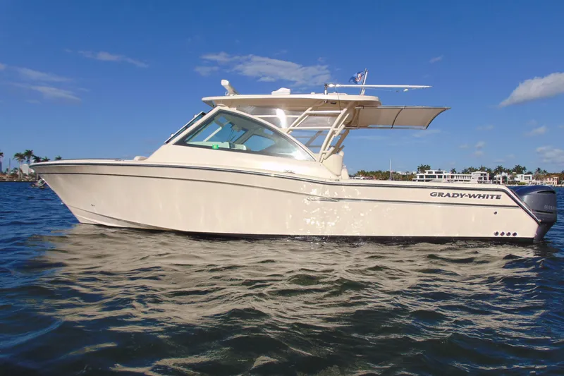 The Image of 2018 Grady-White Freedom 375 boat on water under clear blue sky. - 0