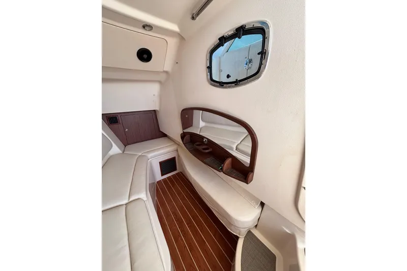 Slide: The Image of Interior of 2018 Grady-White Freedom 375 boat with elegant seating and wood accents. - 15