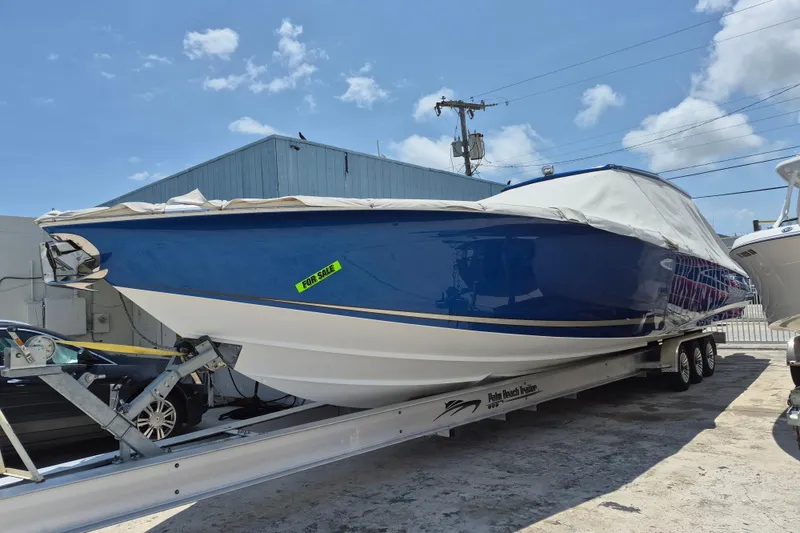 The Image of 2020 Nor-Tech 450 Sport Center Console boat on trailer, blue hull, for sale. - 0