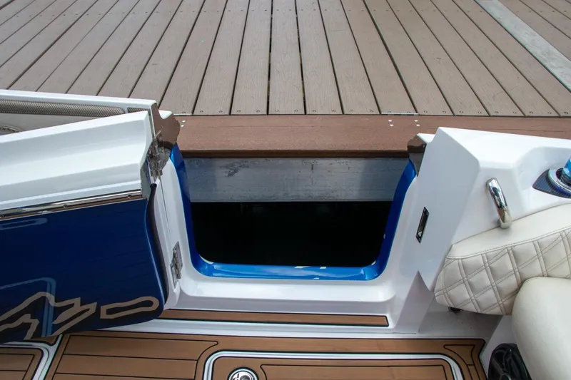 Slide: The Image of Manufacturer Provided Image: 2020 Nor-Tech 450 Sport Center Console boat with open side door. - 5