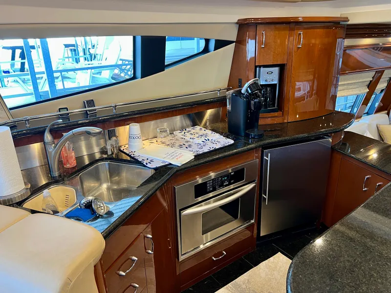 Slide: The Image of Luxurious kitchen on a 2005 Marquis 59 yacht. - 14