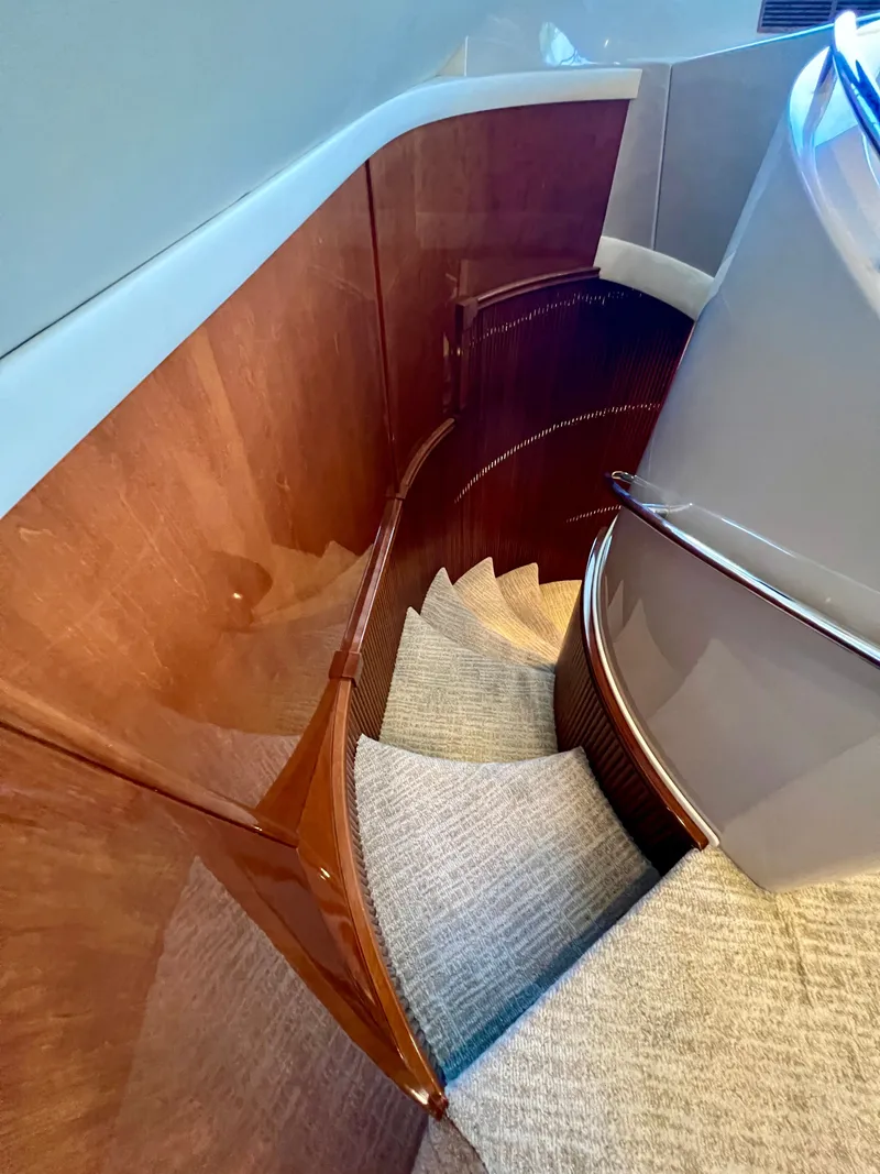 Slide: The Image of Elegant spiral staircase in a 2005 Marquis 59 yacht. - 18