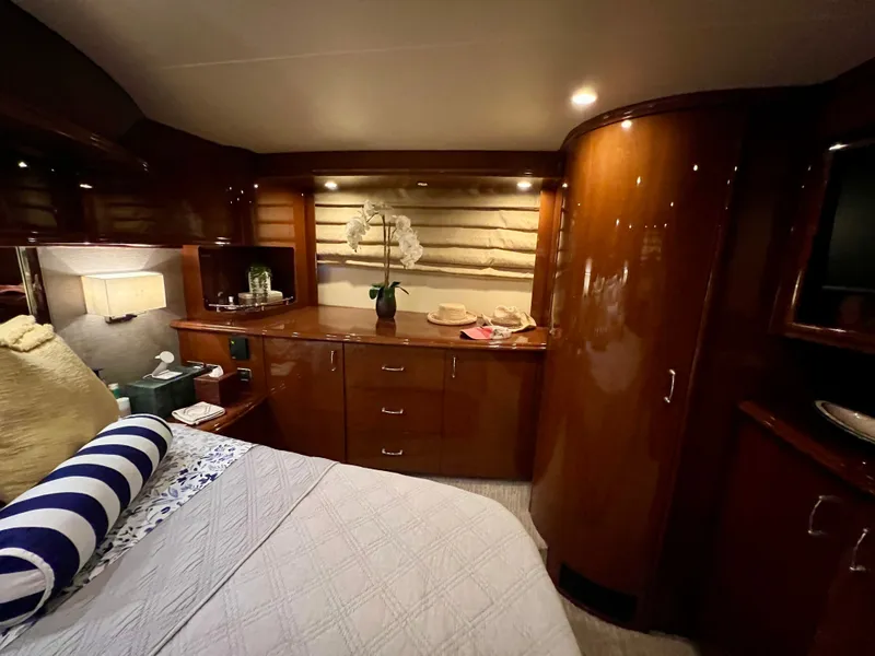 Slide: The Image of Luxurious bedroom in a 2005 Marquis 59 yacht. - 22