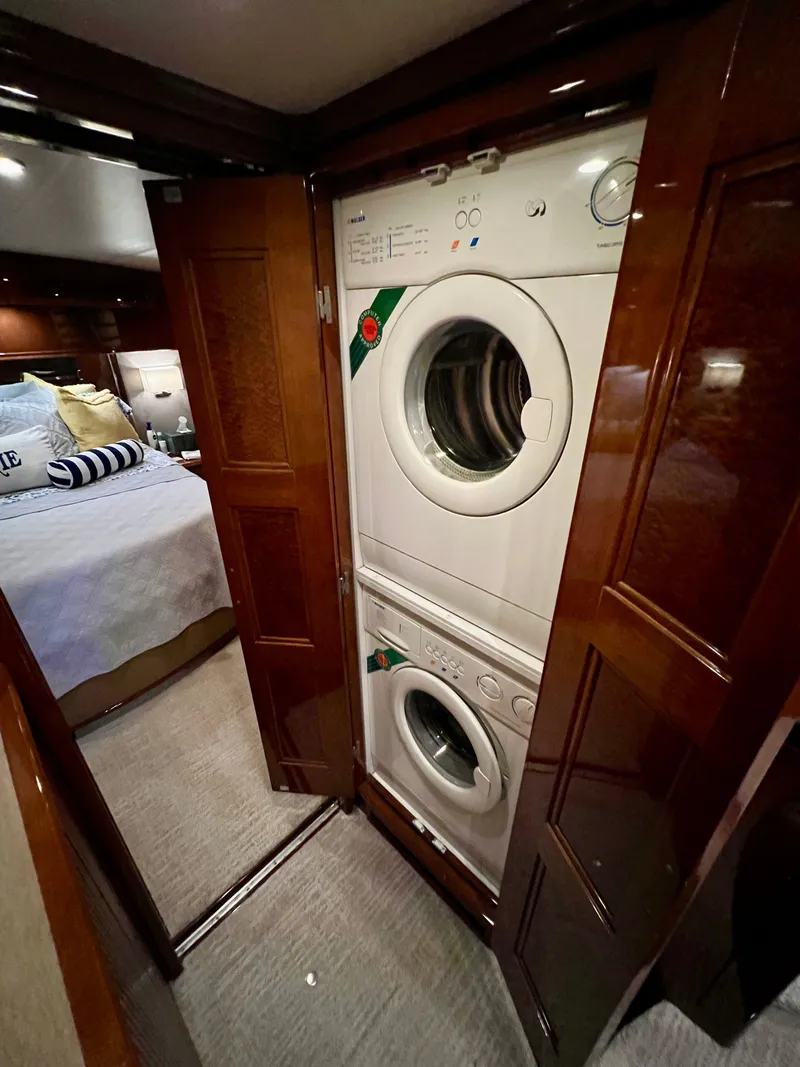 Slide: The Image of Washer and dryer in a 2005 Marquis 59 yacht. - 29