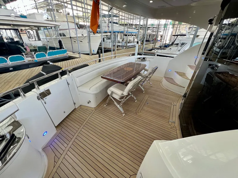 Slide: The Image of Luxurious Marquis 59 yacht deck with seating area, 2005 model. - 36