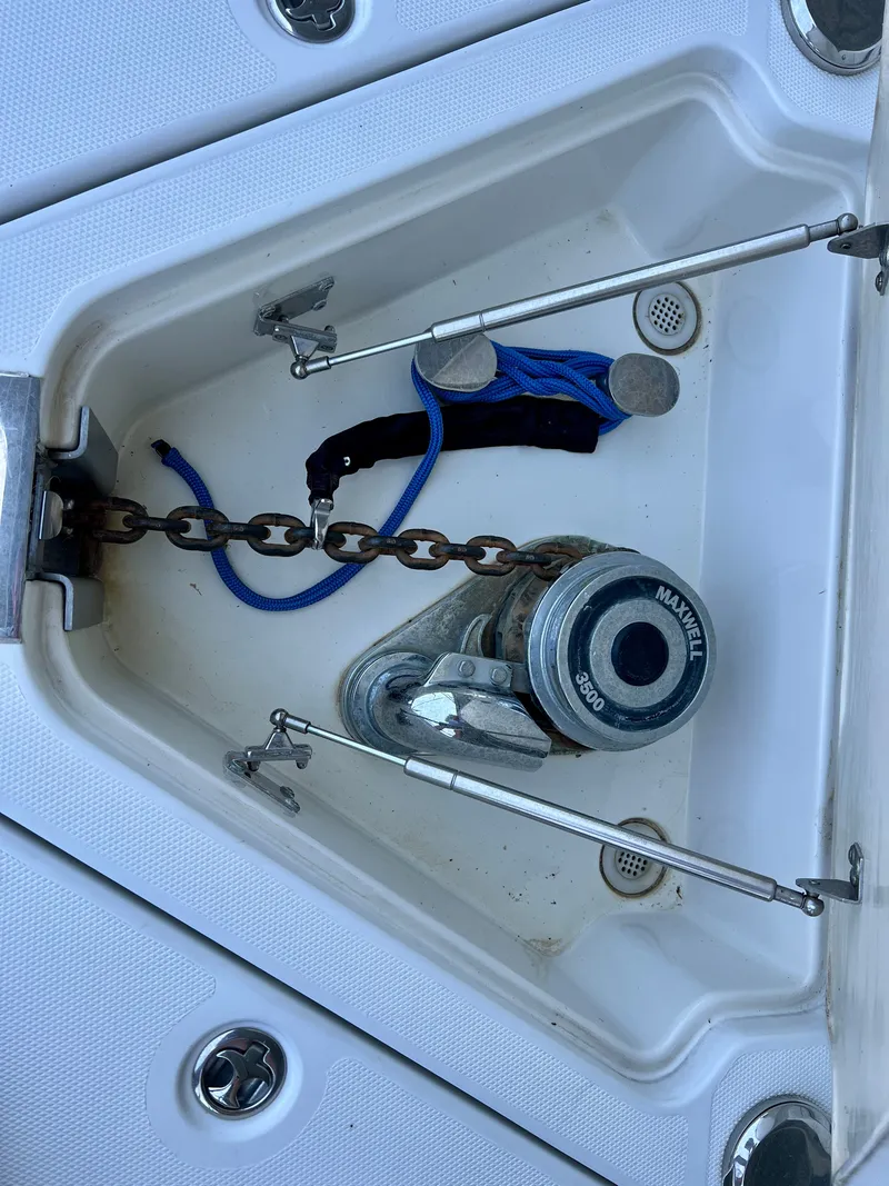 Slide: The Image of Anchor windlass on a 2005 Marquis 59 boat. - 42