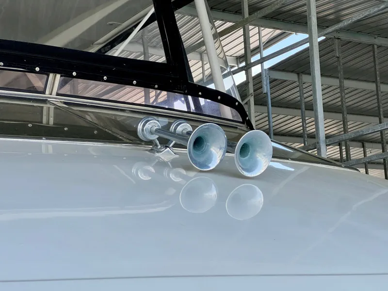 Slide: The Image of Close-up of horns on a 2005 Marquis 59 boat. - 44