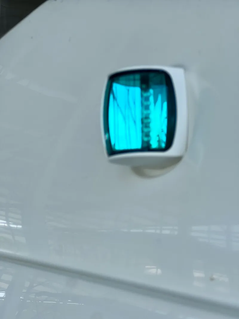 Slide: The Image of Close-up of a blue light on a 2005 Marquis 59. - 45