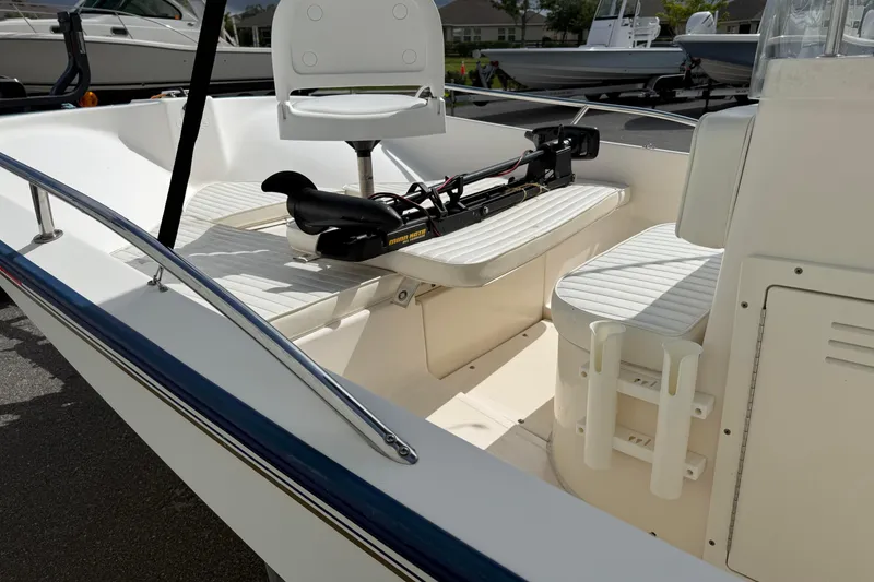 Slide: The Image of 2002 McKee Craft WayPoint boat interior with seating and mounted equipment. - 7