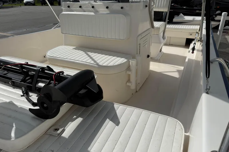 Slide: The Image of 2002 McKee Craft WayPoint boat interior with seating and equipment. - 8
