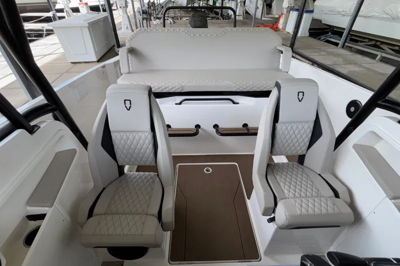 Slide: The Image of Interior of 2025 Navan S30 boat with modern seating and sleek design. - 45