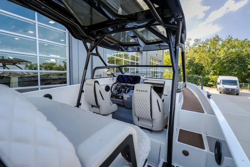 Slide: The Image of Interior view of 2025 Navan S30 boat with modern seating and steering console. - 24