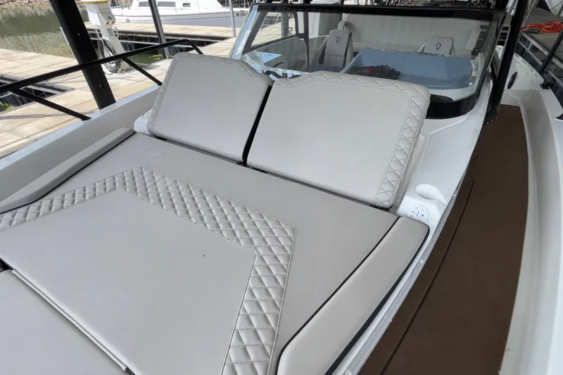 Slide: The Image of Luxurious seating on 2025 Navan S30 boat with quilted upholstery design. - 56