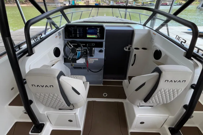 Slide: The Image of Interior of 2025 Navan S30 boat with modern dashboard and comfortable seating. - 37