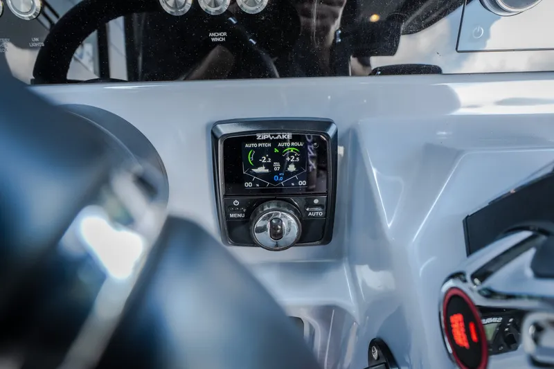 Slide: The Image of Control panel of 2025 Navan S30 boat featuring Zipwake auto pitch and roll system. - 31