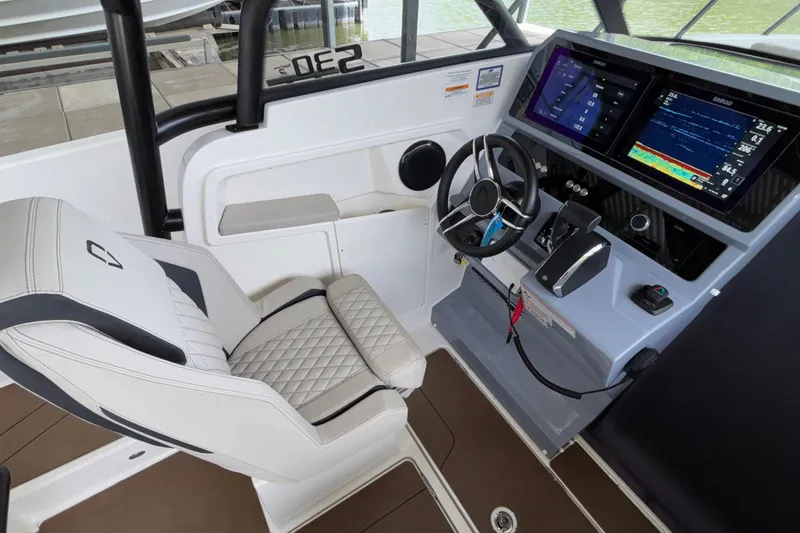Slide: The Image of Interior of 2025 Navan S30 boat with modern dashboard and luxurious seating. - 41