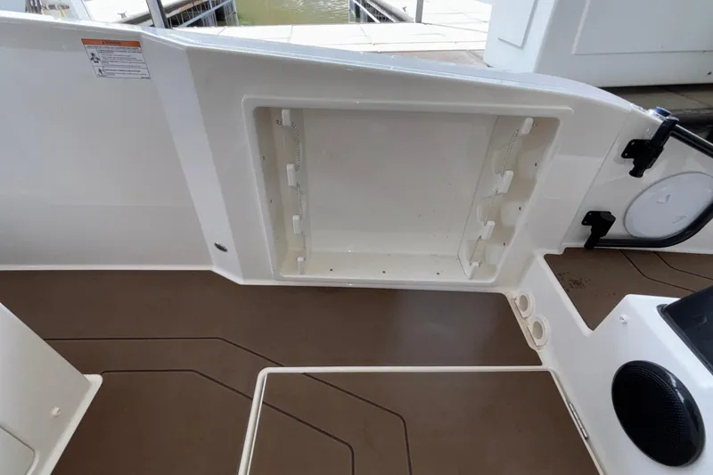Slide: The Image of Interior view of 2025 Navan S30 boat, featuring storage compartment and sleek design. - 27