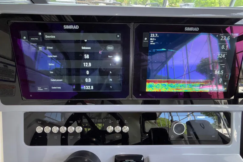 Slide: The Image of Simrad navigation display on 2025 Navan S30 boat, showing engine and sonar data. - 49