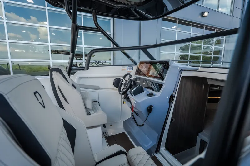 Slide: The Image of Interior of 2025 Navan S30 boat with modern steering and seating. - 27