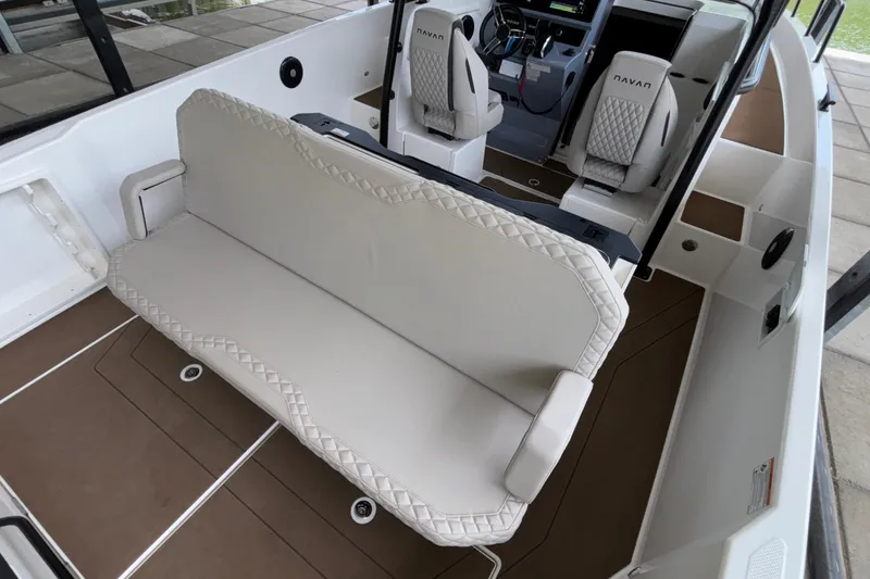 Slide: The Image of Interior of 2025 Navan S30 boat with luxurious seating and modern dashboard. - 29