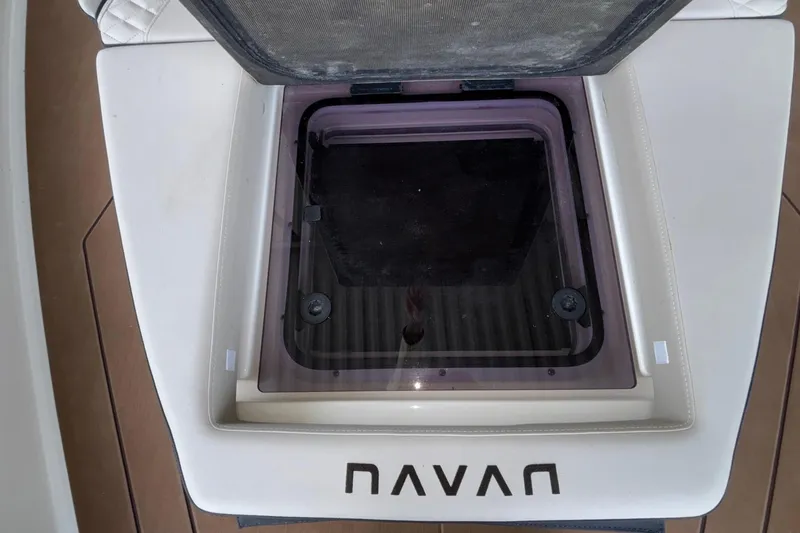 Slide: The Image of Open hatch on Navan S30 boat, 2025 model, with visible seating area. - 55