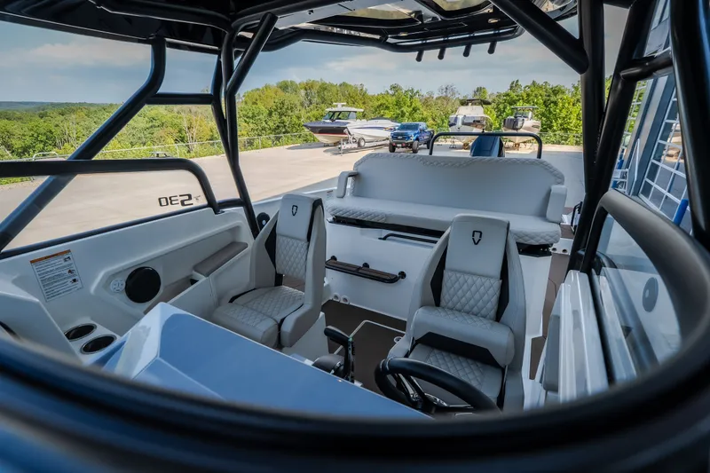 Slide: The Image of Interior of 2025 Navan S30 boat with modern seating and scenic outdoor view. - 53