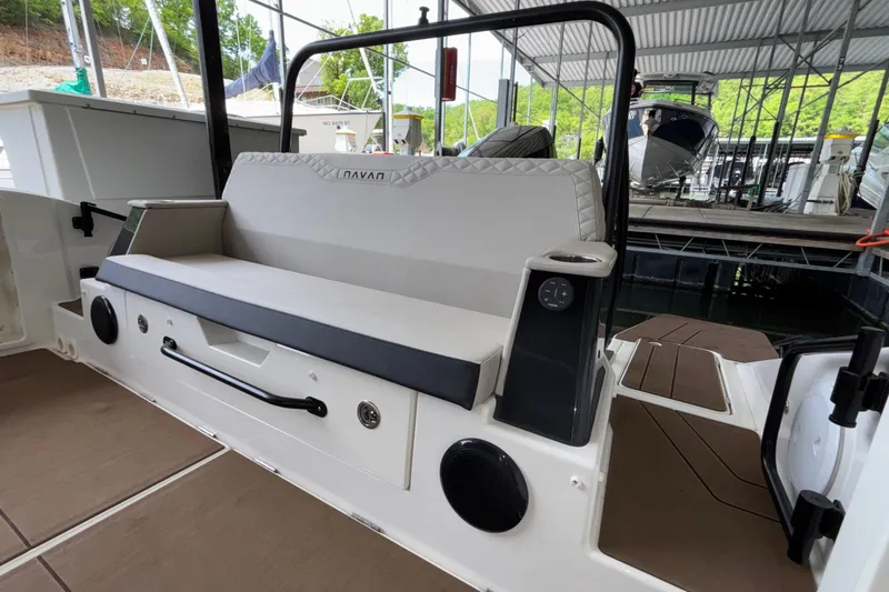 Slide: The Image of 2025 Navan S30 boat interior with cushioned seating and modern design elements. - 20