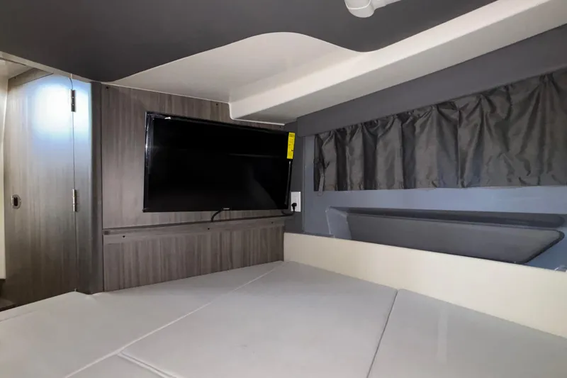 Slide: The Image of Interior of 2025 Navan S30 with TV, modern design, and comfortable seating. - 69