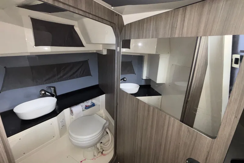 Slide: The Image of Modern bathroom interior in 2025 Navan S30, featuring sleek sink and toilet design. - 71
