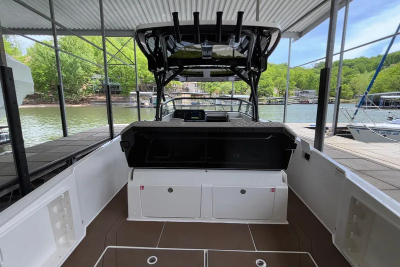 Slide: The Image of 2025 Navan S30 boat interior at dock, featuring sleek design and modern amenities. - 16