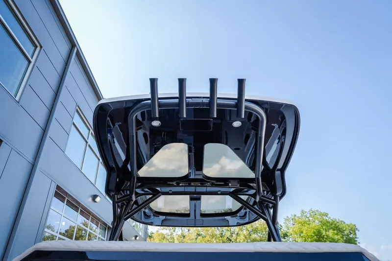 Slide: The Image of 2025 Navan S30 boat canopy with sleek design against blue sky backdrop. - 22