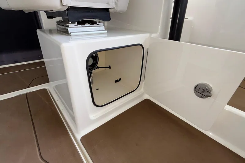 Slide: The Image of Storage compartment in 2025 Navan S30 boat, featuring open hatch and secure latch. - 40