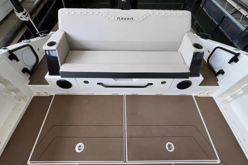 Slide: The Image of Luxurious seating area on 2025 Navan S30 boat with cup holders and storage. - 18