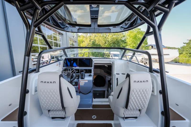 Slide: The Image of Interior view of 2025 Navan S30 boat cockpit with modern controls and seating. - 28