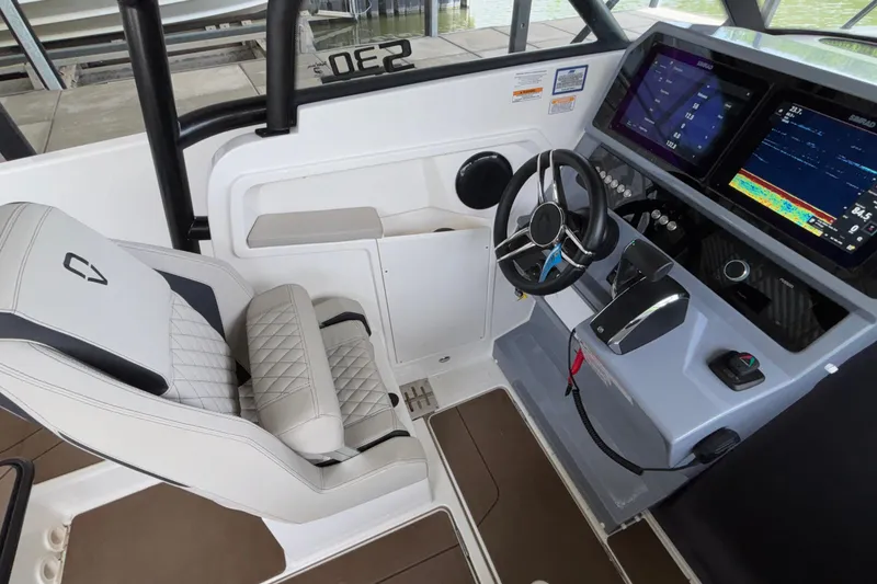 Slide: The Image of Modern Navan S30 boat cockpit with advanced navigation displays and luxurious seating, 2025 model. - 44