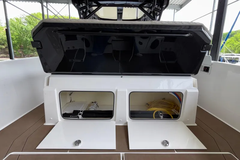 Slide: The Image of 2025 Navan S30 boat storage compartments with open hatches, showcasing interior equipment. - 25
