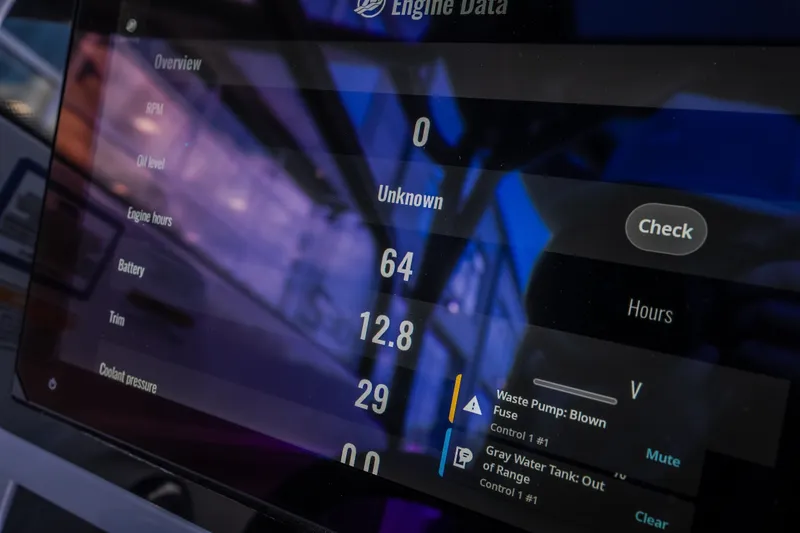 Slide: The Image of Dashboard of 2025 Navan S30 displaying engine data and alerts. - 35