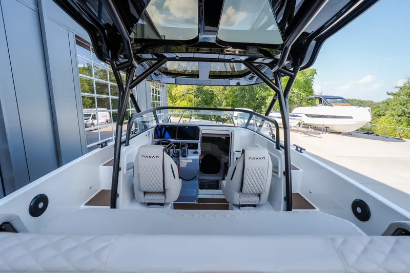 Slide: The Image of Interior view of 2025 Navan S30 boat with modern seating and control panel. - 23