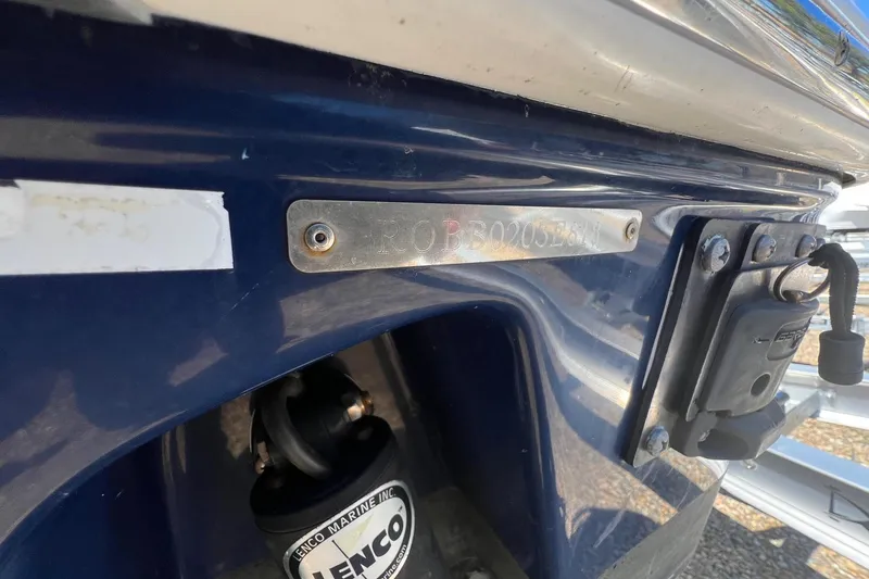 Slide: The Image of 2018 ROBALLO R242 boat hull identification number plate close-up. - 16
