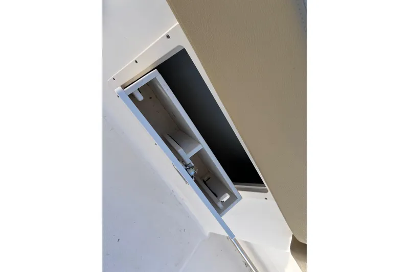 Slide: The Image of Open storage compartment on 2018 ROBALLO R242 boat interior. - 23