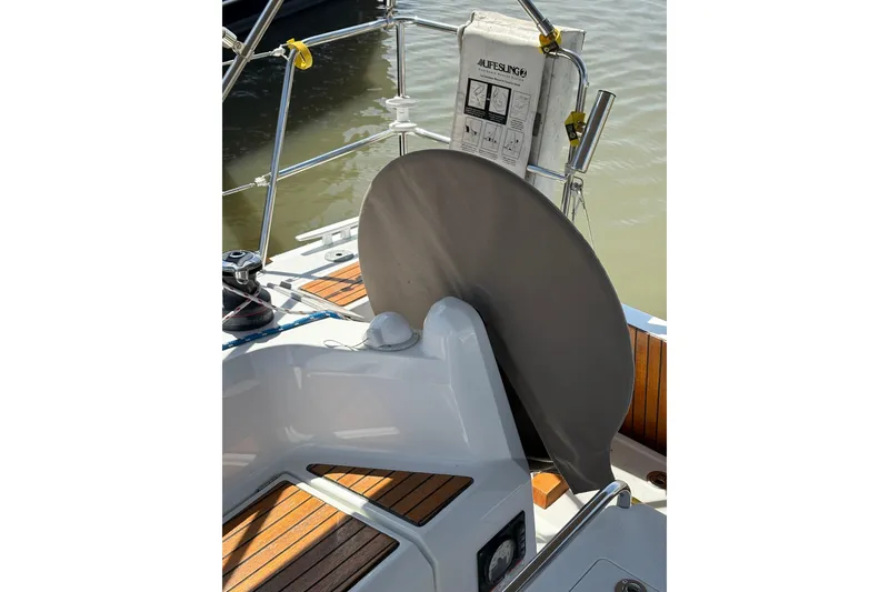 Slide: The Image of Cockpit of 2017 Jeanneau Sun Odyssey 349 sailboat with safety equipment. - 11