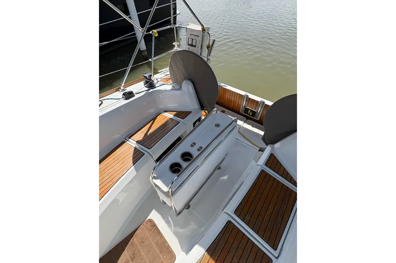 Slide: The Image of Cockpit of 2017 Jeanneau Sun Odyssey 349 with teak flooring and dual steering wheels. - 12
