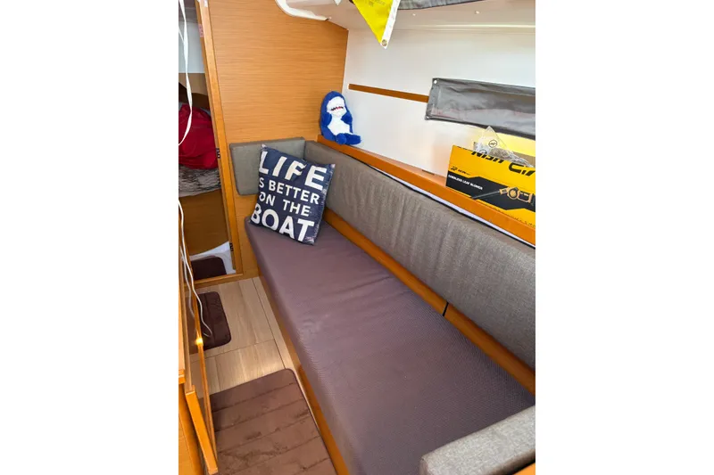 Slide: The Image of Interior of 2017 Jeanneau Sun Odyssey 349 with cozy seating and nautical decor. - 38