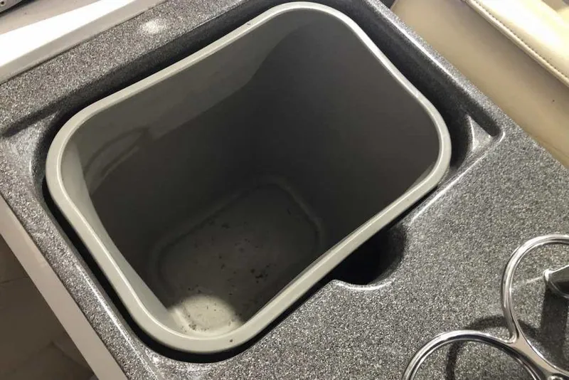 Slide: The Image of Storage compartment on a 2007 Regal 3350 Sport Cruiser boat. - 22